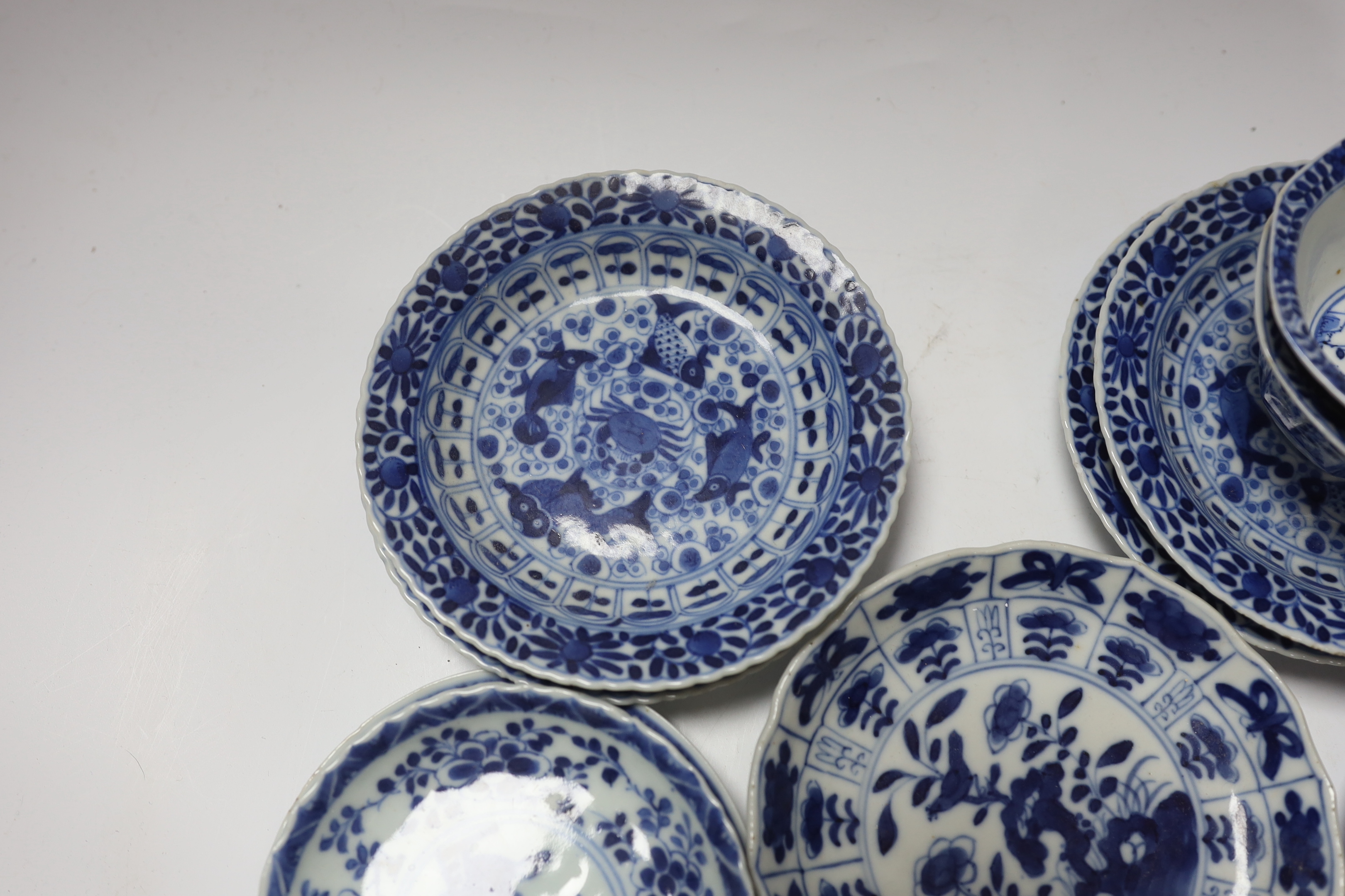 Two pairs of 19th century Chinese blue and white teabowls and saucers, a set of six other blue and white saucers, another and a teabowl, all 19th century (17)